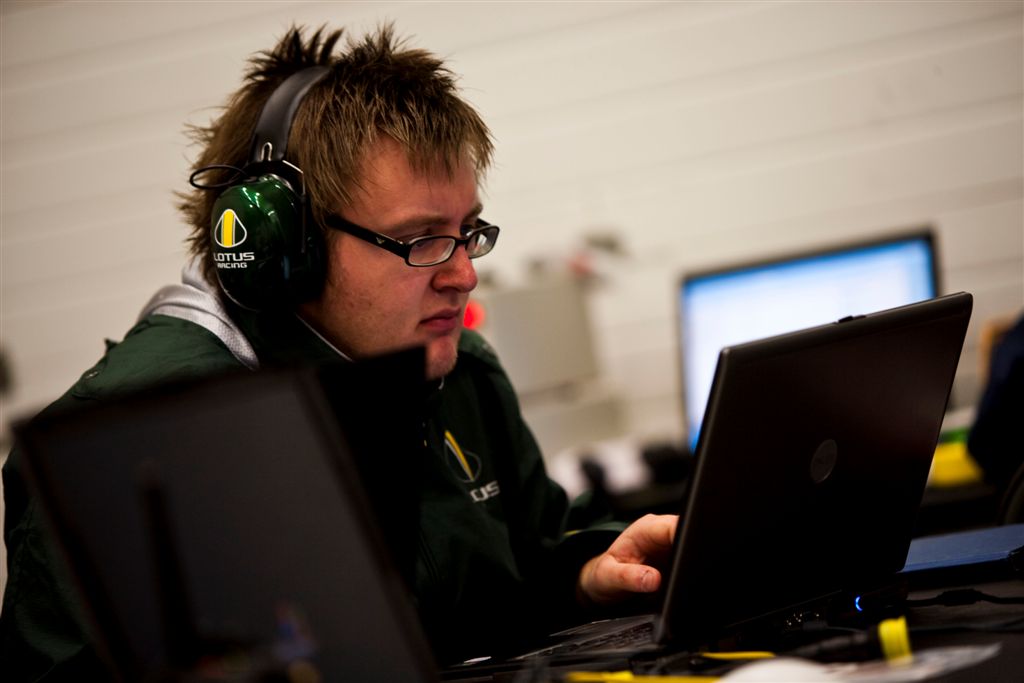 Lotus Racing Jerez Test Day 4 engineer in garage working har