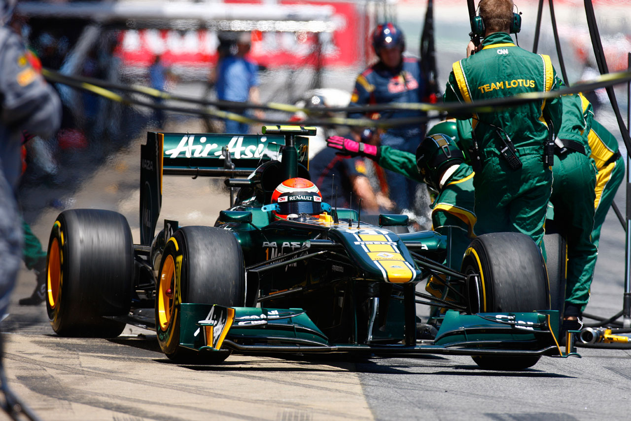 5747113859 f49b33ab10 Jarno Trulli leaves The pits during The race O