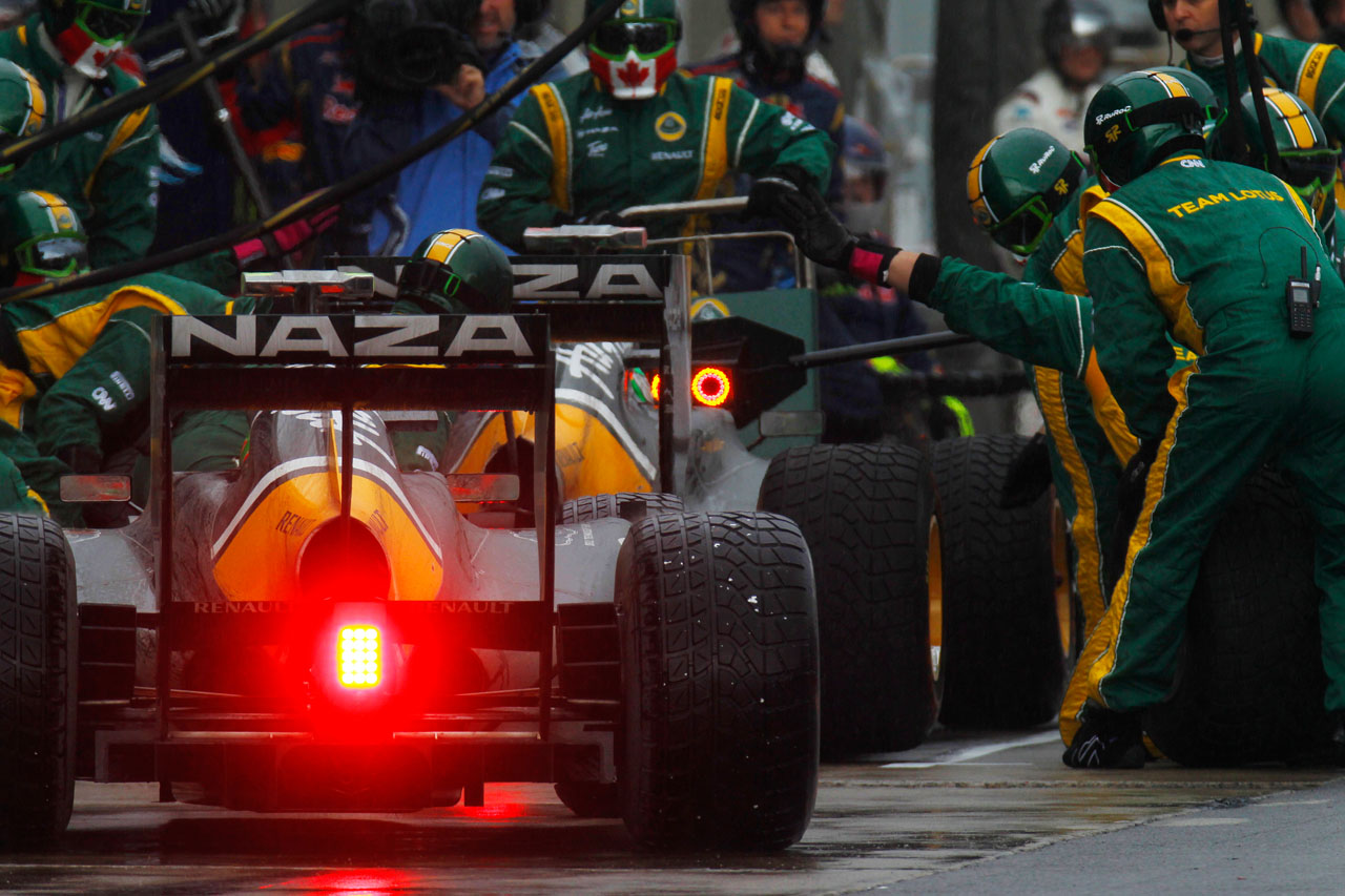 5831669205 e0e4679d58 Jarno Trulli And Heikki Kovalainen In The pits during The race O