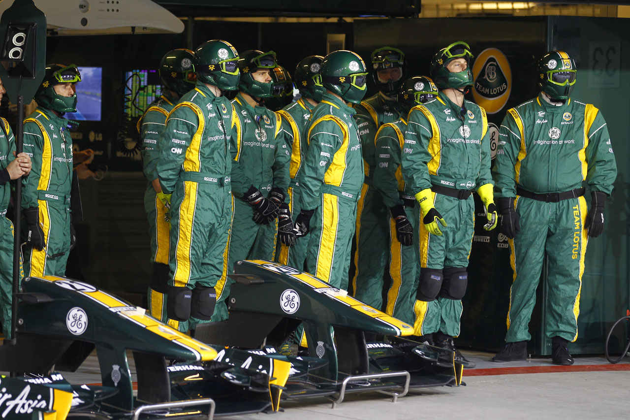 6340977266 66e5223396 Team Lotus mechanics ready For The pitstop O