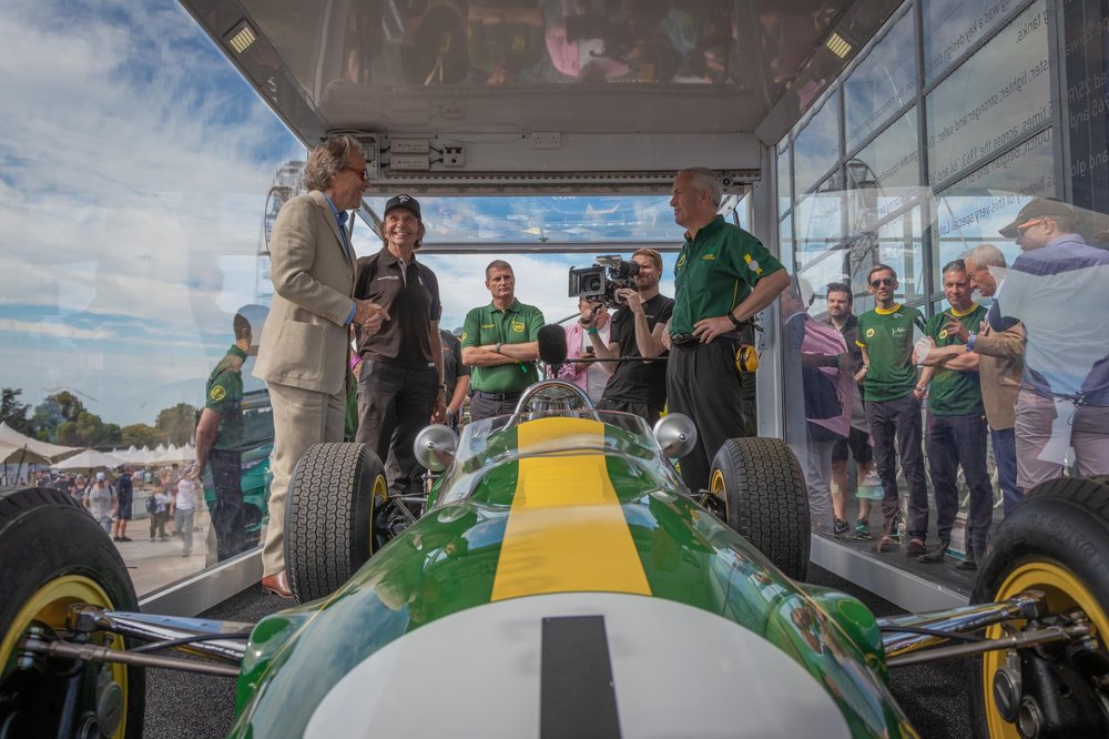 Duke of Richmond_Emerson Fittipaldi_Phil Popham_Clive Chapman Goodwood FOS Lotus Stand Visit - High Res-9.jpg